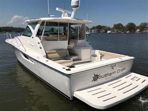 The 38 LS features walk-around capabilities and an outdoor galley, while the signature rotating U-lounge transforms the aft cockpit, offering both versatility and comfort. . Boat trader dallas